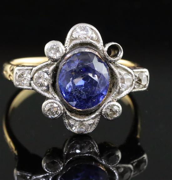 An early-mid 20th century 18k gold, sapphire and diamond cluster ring, size L.